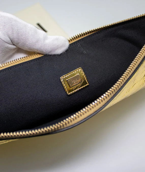 Fendi Gold Laminated Leather FF Tassel Clutch