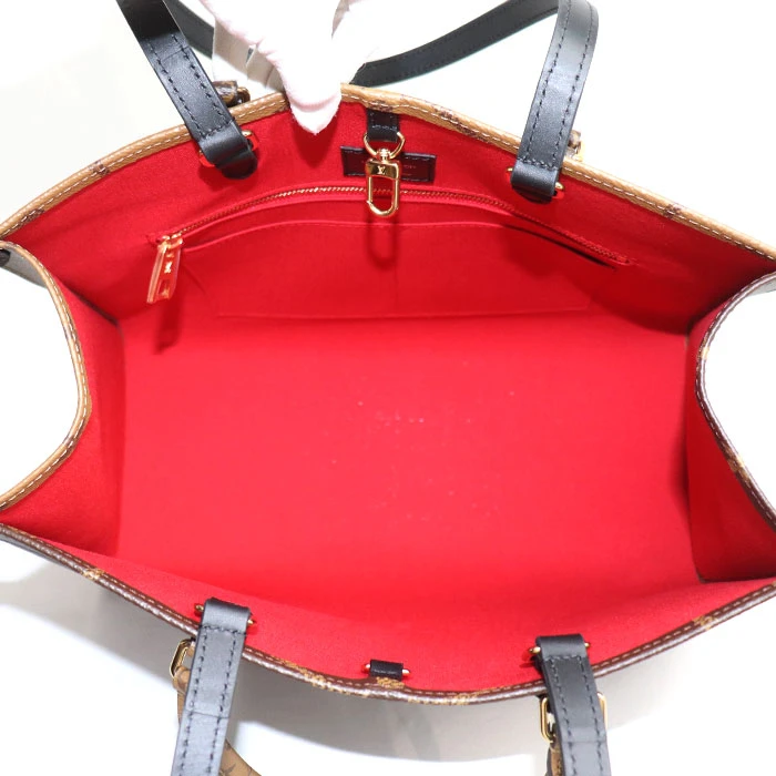 Louis Vuitton Reverse Monogram On The Go MM Shoulder Bag